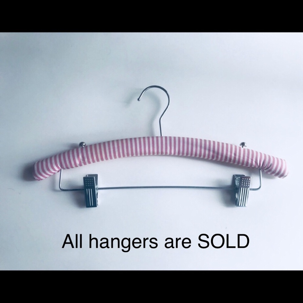 Pink/White striped VS padded hangers.